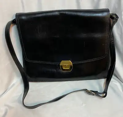Beautiful vintage small briefcase with crossbody strap. Amiet is known for its locks and this case o...