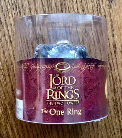 Wield the power with this 2002 Applause Lord of the Rings: Two Towers "The One Ring". The piece is s...