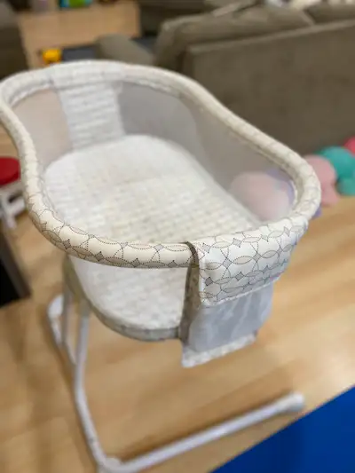 Baby bed side bassinet with height adjustment. Condition: Used but very good