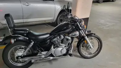 2015 Yamaha V-Star 250, runs great and smooth, perfect starter bike for new riders - has a small chi...