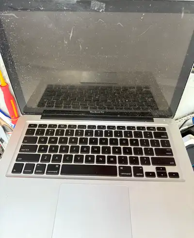 Apple MacBook Pro for parts broken as is, View more