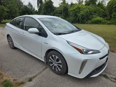 2022 Prius AWD-e with Technology Package, 96,000 km, new all-season tires, snows included on steel r...