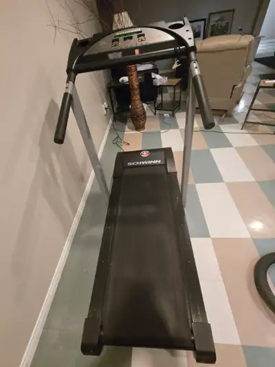 Schwinn treadmill in great condition. No longer being used. Asking $250. Will require a strong 'lift...