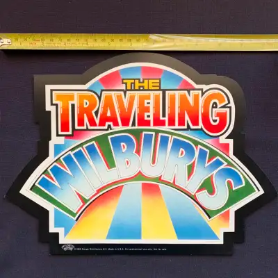 Very colourful display panel from 1988 promoting The Traveling Wilburys. Aproximately 12” X 10”.