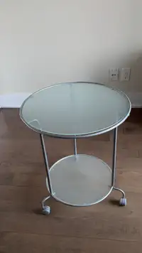 Glass coffee table with metal legs