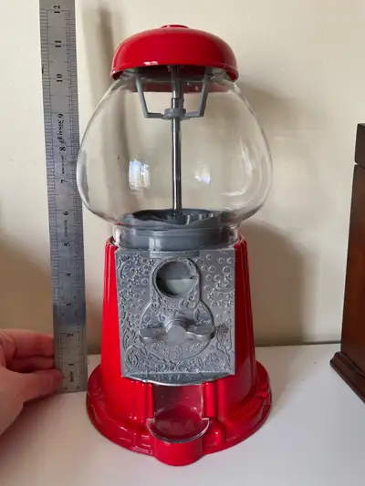 Red metal gumball machine, View more