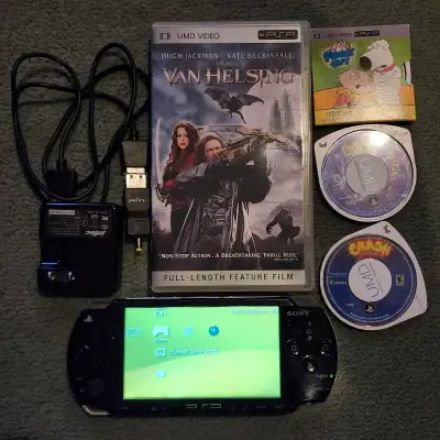 Sony PSP games + movies+ 2gb card, View more