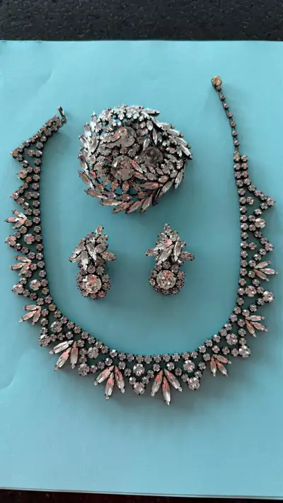 Gorgeous Sherman necklace, matching clip-on earrings and brooch. Set is in excellent condition. The...