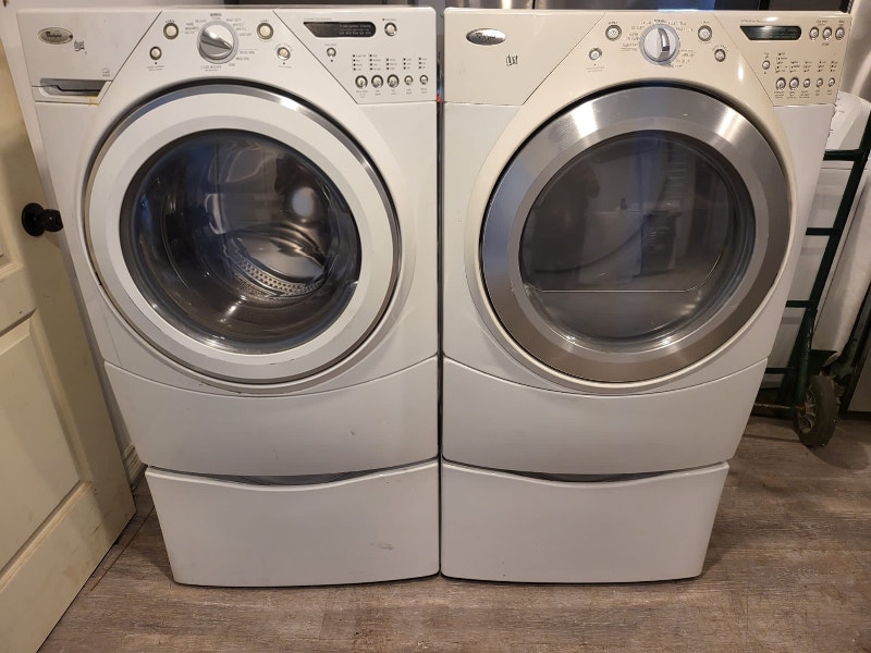 Whirlpool 27” w front load washer electric dryer set with pedest