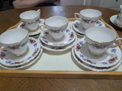 This set of five Royal Sutherland fine bone china teacups and saucers, made in Staffordshire, Englan...