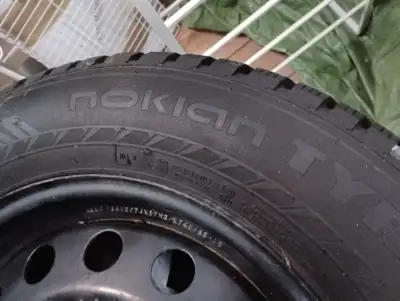 4 Nokian-Nordman-9-SUV-Studded-Winter-225-65R17 snow tires. Used one season, stored for two in barn....
