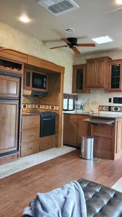 Selling our Forest River 2013, 42-foot Sandpiper fifth-wheel. - Front king-size bedroom - Two bathro...