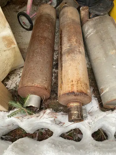 4 large diesel exhaust mufflers. In good working order. $150 each