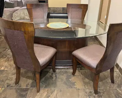Brown dining table and chairs. Glass top. Collection only.