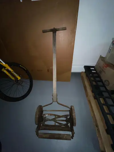 It’s a Forest Glen from Eureka Planter Company. This vintage push reel lawn mower is a quirky find,...
