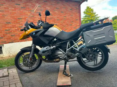 Enduro-style hybrid bike with ABS, heated handle grips, adjustable seat and suspension, hard shell l...