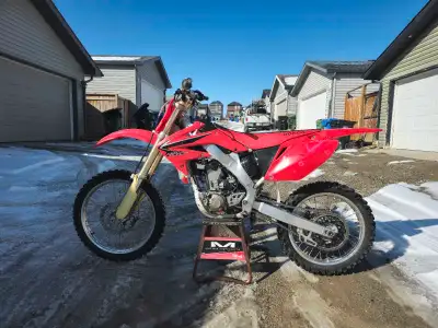 2008 Honda CRF250R in like new condition. Bike received a complete overhaul including brand new OEM...