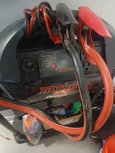 Selling a MotoMaster Eliminator PowerBox Portable Power Pack. Great handy tool for roadside emergenc...