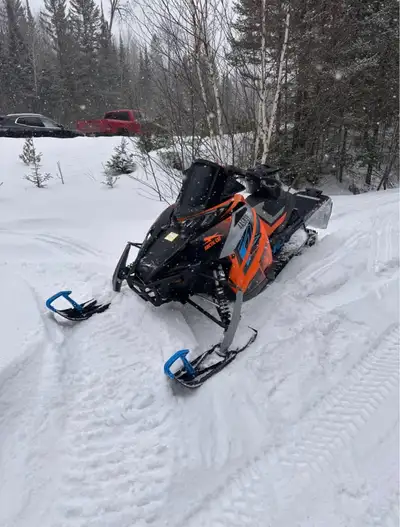 Excellent Condition, stored inside enclosed trailer. Has a fully Studded Track. Heated Hand and Thum...