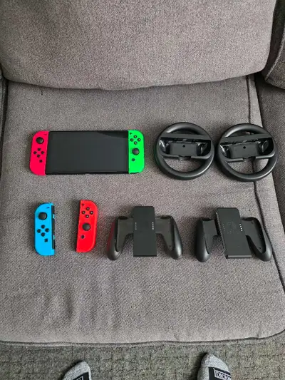 SWITCH OLED WITH LOTS OF ACCESSORIES , View more