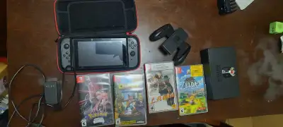 Nintendo Switch with 4 games, View more