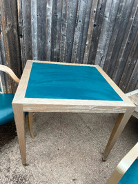 Card table on wheels with chairs