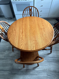 Solid oak table with 4 chairs 