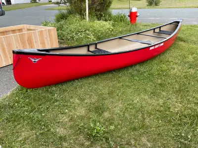 Very rare canoe… Nova craft prospector 16 ft in royalite… only 57 lbs. All new custom black wood int...