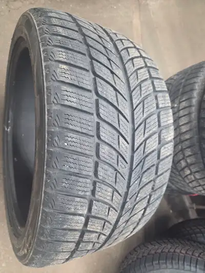 Used but in good condition Staggered winter tires still have more than 6-32nd life . Front tires 275...