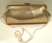 NEW, METALLIC ROSE GOLD EVENING BAG WITH LONG CORD