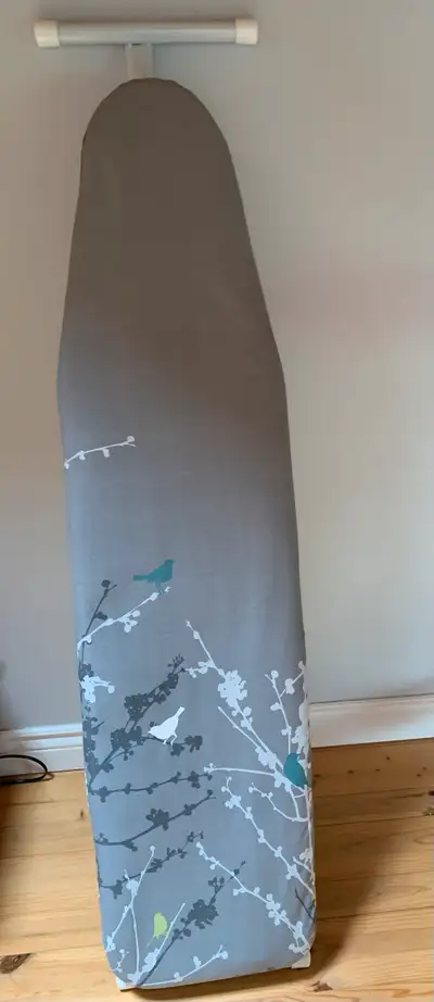 Ironing Board with Cover. Pickup Musselman’s Lake area.