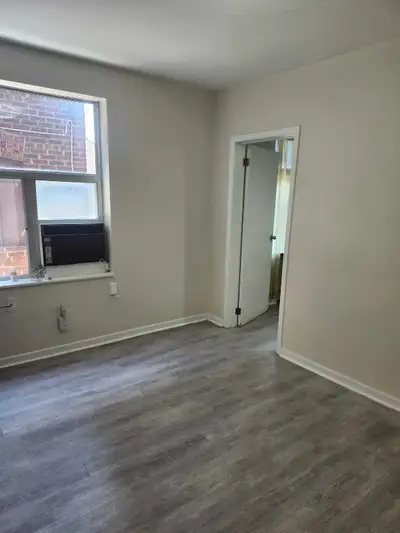 Newly Renovated One Bedroom plus sizable living room with Private entrance on the ground floor of a...
