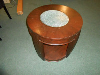 Oval solid wood end table with glass centre