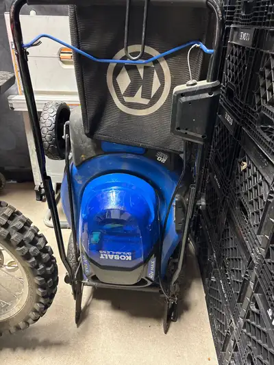 Kobalt 40V lawn mower with bag and accessories. Works great, needs new battery that goes for $80 on...
