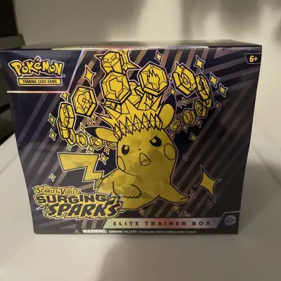 Pokémon Surging Sparks Elite Trainer Box — Sealed, View more