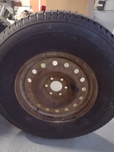 4 P275 75R/16 Firestone Winter force M+S studded tires and 6 hole rims. Came from a Nissan Frontier....