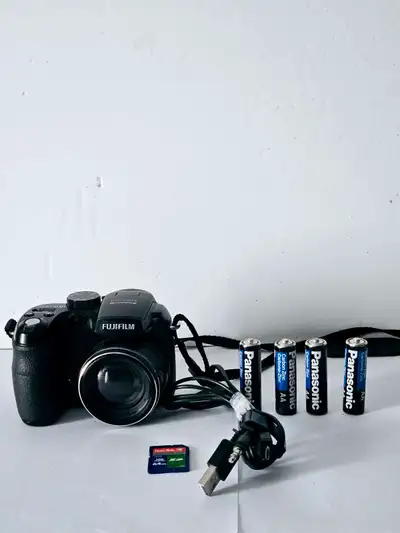 Fujifilm FinePix S1000FD 10.0 MP Digital Camara. Comes with SD Card, Batteries, AV Cable. Works grea...