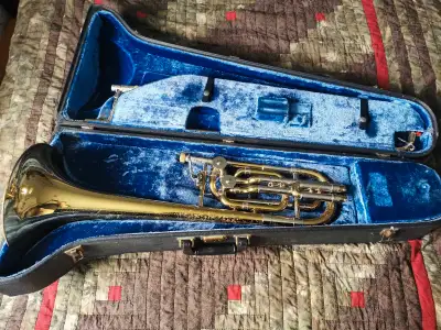 Vintage, double valve, dependent, closed wrap bass trombone for sale. Has seen much love and needs a...