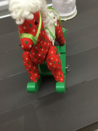 Classic Christmas rocking horse plays music