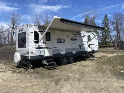 $2000 DISCOUNTED PRICE 2014 Camper, 27ft. Stored indoors every winter. - Power canopy - Power Jacks...