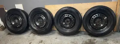 4 Minerva Eco Stud SUV mud and snow tires on steel rims. Size 245/65 R17. Very low mileage. Lots of...