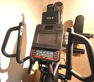 Like new! SOLE Fitness E95 Elliptical with 13.3 Inch Touchscreen, Bluetooth, Wi-Fi, 20 Inch Stride,...