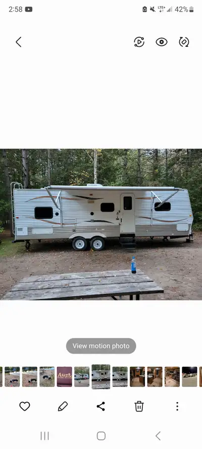 Has a queen bedroom in the front, table turns onto a bed, single over double bunk, 2 reclining chair...