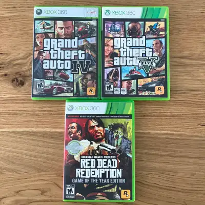 $15 lot XBOX 360 Grand Theft Auto IV & 5 + Red Dead Redemption, View more