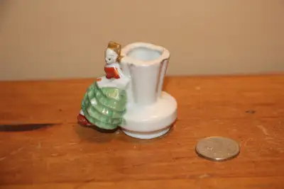 Hi. I have a vintage Occupied Japan toothpick holder for sale. The piece shows some wear and marks....