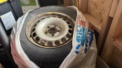 Selling a set of 4 lightly used 215/65R16 Royal Snow tires on steel rims, offering reliable winter t...