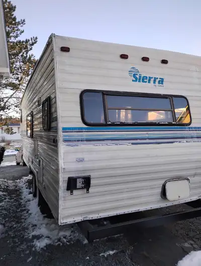 I'm selling a Sierra by Cobra travel trailer, perfect for your next adventure! This well-loved trave...