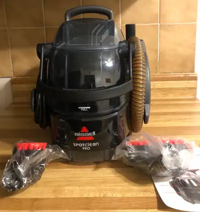 Get your carpets and upholstery looking spotless with this Bissell SpotClean Pro portable carpet cle...