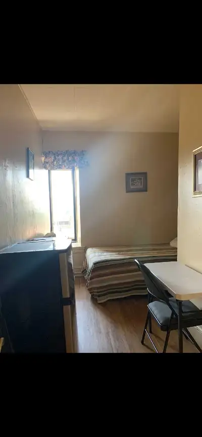 Furnished room available for rent on top floor in secure, clean, quiet rooming house in the heart of...