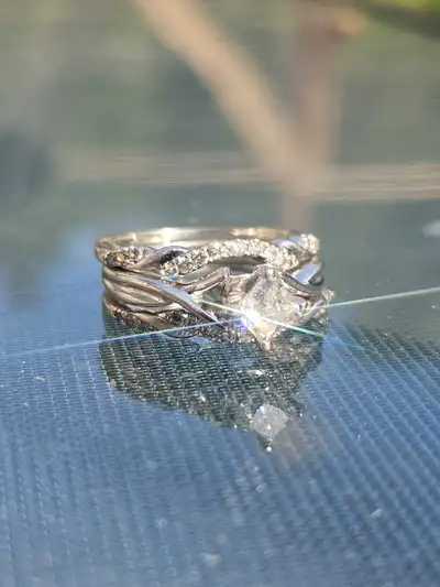 3 gold ring set with certified diamond. Recently inspected and cleaned with original box, certificat...